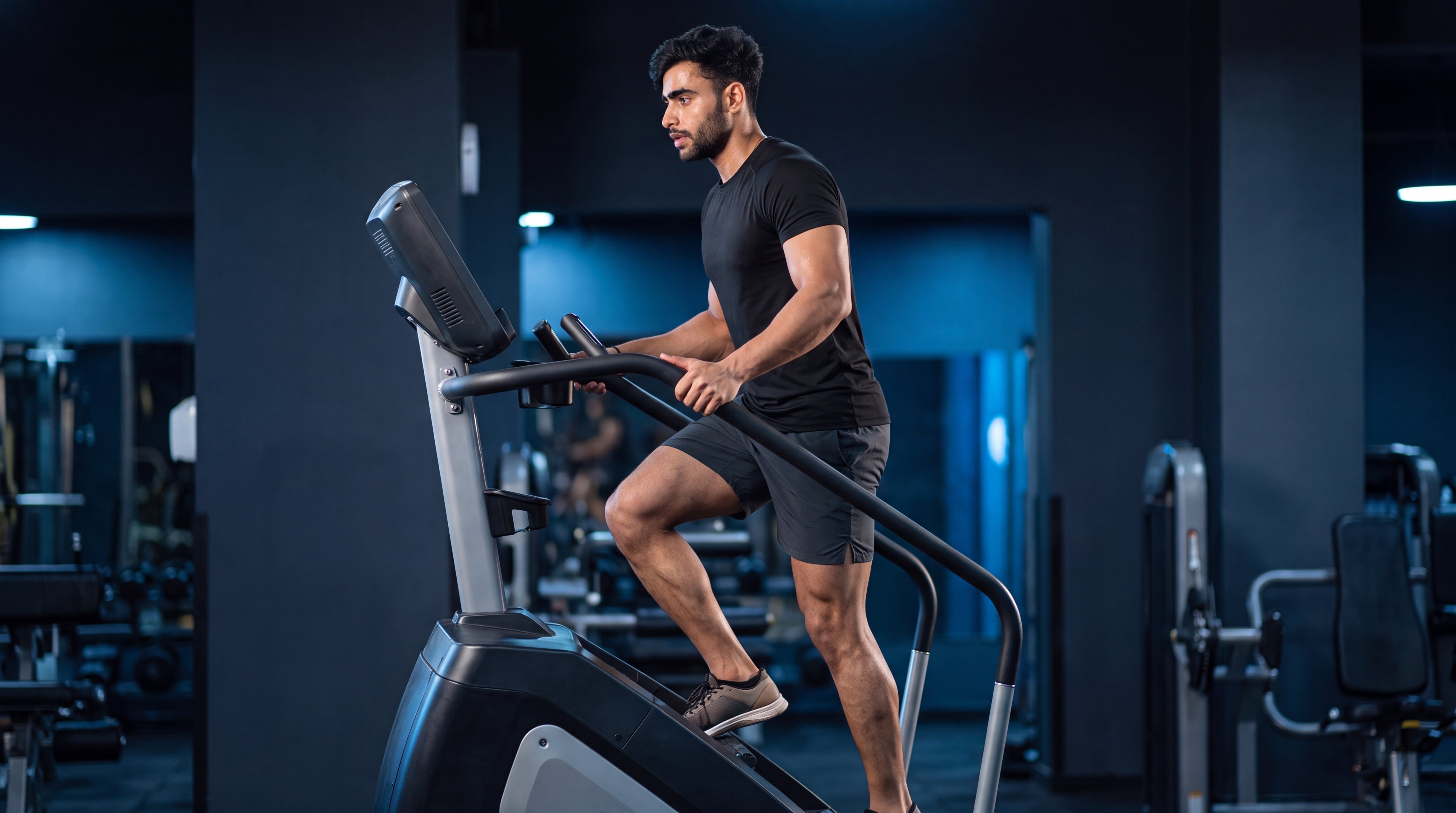 Athlete exercising on a stair climber machine