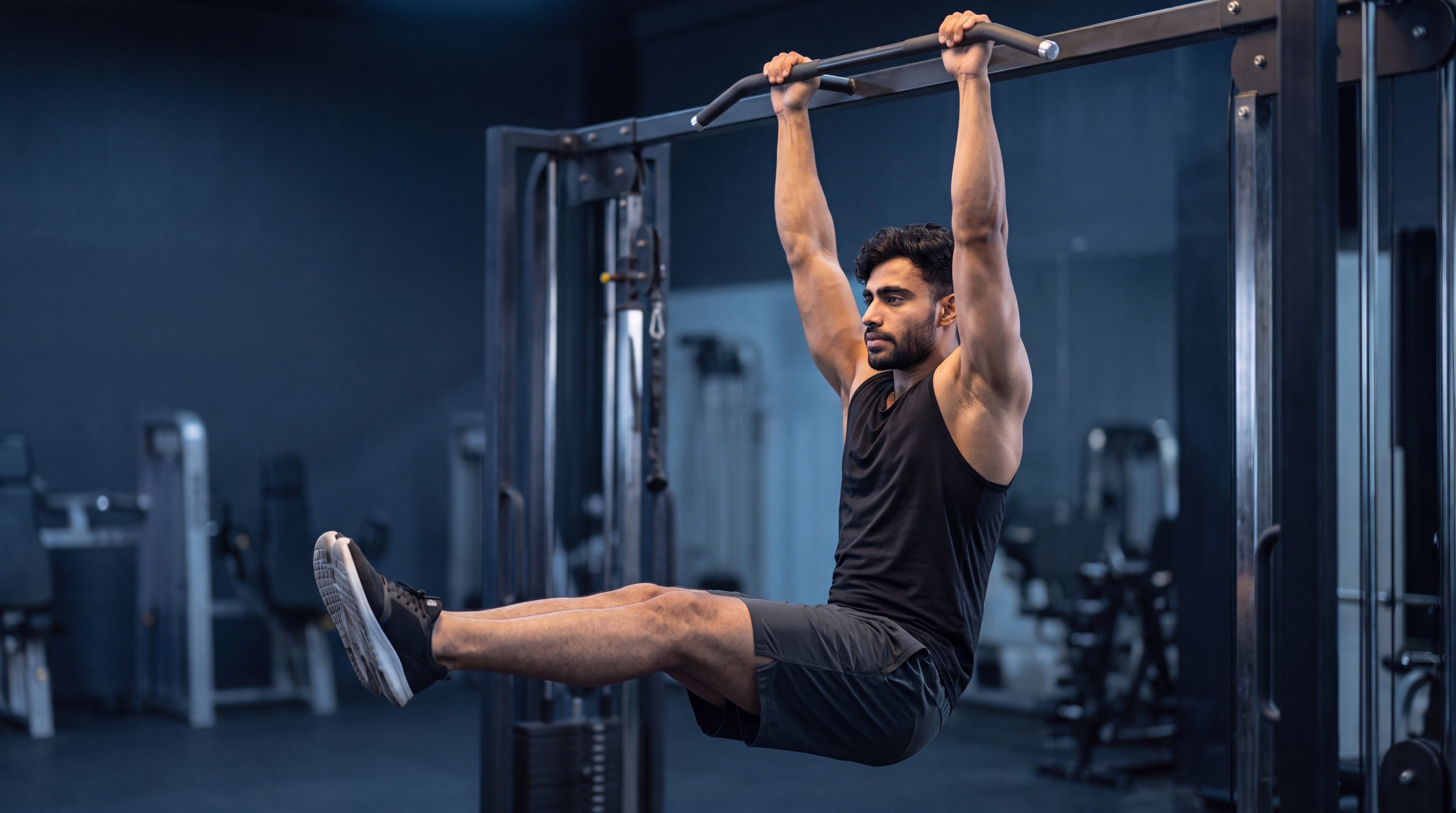 Athlete performing a hanging leg raise